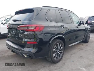 2023 BMW X5 xDrive45e z VIN 5UXTA6C02P9P59732, wystawiony jako IAAI lot #40713343 z przebiegiem Nie podano mil oraz . Historia ofert i sprzedaży dostępna na DreamBid. Obrazek 4.
