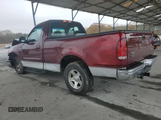 1999 Ford F-150 XL with VIN 2FTRF17L0XCB19827, listed as a Copart auction lot 85282164 with 52,103 mi miles and Salvage title. Bid and sale history available at DreamBid. Image 2.