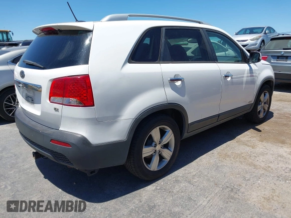 2013 Kia Sorento EX with VIN 5XYKUDA64DG370245, listed as a IAAI auction lot 42688504 with 172,060 mi miles and . Bid and sale history available at DreamBid. Image 4.