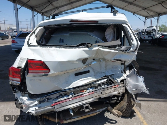 2021 Volkswagen Atlas SE z VIN 1V2HR2CA8MC514027, wystawiony jako IAAI lot #42260413 z przebiegiem 37 687 mil mil oraz . Historia ofert i sprzedaży dostępna na DreamBid. Obrazek 16.