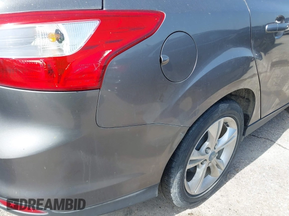 2013 Ford Focus SE with VIN 1FADP3F23DL131327, listed as a IAAI auction lot 42577474 with 146,412 mi miles and . Bid and sale history available at DreamBid. Image 6.