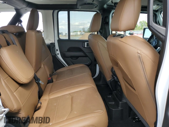 2021 Jeep Wrangler Unlimited Sahara z VIN 1C4JJXP65MW766023, wystawiony jako Copart lot #52332735 z przebiegiem 23 130 mil mil oraz Nie do naprawy • Non repairable. Historia ofert i sprzedaży dostępna na DreamBid. Obrazek 10.