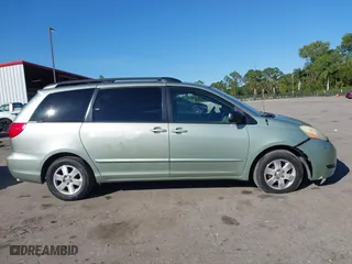 2010 Toyota Sienna CE with VIN 5TDKK4CC2AS329149, listed as a IAAI auction lot 41454554 with 202,599 mi miles. Bid and sale history available at carsss.com. Image 14.