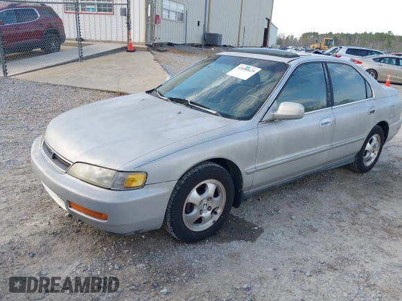 1997 Honda Accord Special Edition with VIN 1HGCD560XVA267719, listed as a IAAI auction lot 41680625 with 325,852 mi miles and . Bid and sale history available at carsss.com. Image 2.