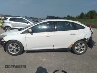 2013 Ford Focus SE with VIN 1FADP3F28DL215983, listed as a IAAI auction lot 42659890 with 117,912 mi miles and . Bid and sale history available at DreamBid. Image 14.