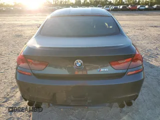 2015 BMW M6 z VIN WBS6C9C52FD468030, wystawiony jako Copart lot #81739974 z przebiegiem 66 861 mil mil oraz Szkoda całkowita • Salvage title. Historia ofert i sprzedaży dostępna na DreamBid. Obrazek 6.