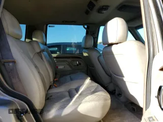 2000 Cadillac Escalade z VIN 1GYEK13R5YR107157, wystawiony jako Copart lot #89024795 z przebiegiem 172 599 mil mil oraz Szkody całkowita. Historia ofert i sprzedaży dostępna na DreamBid. Obrazek 10.