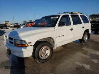 1999 Dodge Durango with VIN 1B4HR28Y0XF585214, listed as a Copart auction lot 77665824 with 126,150 mi miles and Salvage Title. Bid and sale history available at DreamBid. Image 1.