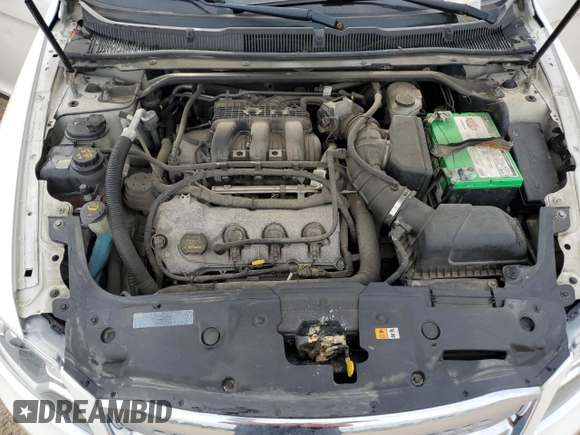 2012 Ford Taurus SEL z VIN 1FAHP2EW8CG138653, wystawiony jako Copart lot #56750215 z przebiegiem 159 631 mil mil oraz Szkoda całkowita • Salvage title. Historia ofert i sprzedaży dostępna na DreamBid. Obrazek 11.