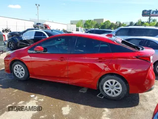2020 Toyota Prius L Eco z VIN JTDKARFUXL3114644, wystawiony jako IAAI lot #42075713 z przebiegiem 78 853 mil mil oraz . Historia ofert i sprzedaży dostępna na DreamBid. Obrazek 14.