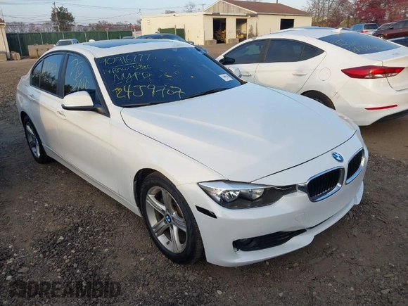 2014 BMW 3 Series 328i xDrive with VIN WBA3B5C52EF958635, listed as a IAAI auction lot 40916777 with 143,975 mi miles. Bid and sale history available at carsss.com. Image 1.