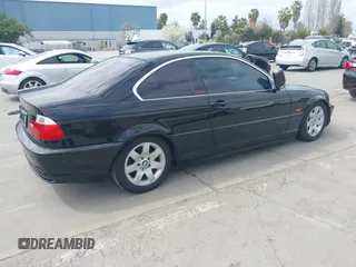2002 BMW 3 Series 325Ci with VIN WBABN33482JW53230, listed as a IAAI auction lot 41912031 with 211,631 mi miles. Bid and sale history available at carsss.com. Image 4.