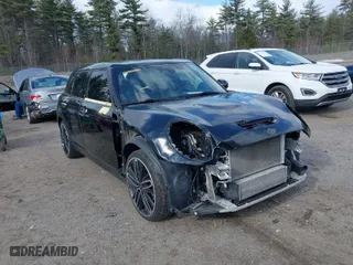 2016 MINI Cooper Clubman S with VIN WMWLN9C53G2E47754, listed as a IAAI auction lot 41893769 with 67,654 mi miles. Bid and sale history available at carsss.com. Image 6.