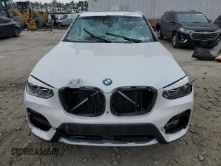 2021 BMW X3 xDrive30i with VIN 5UXTY5C08M9F38091, listed as a Copart auction lot 52566775 with Not Provided miles and Salvage Title. Bid and sale history available at DreamBid. Image 5.