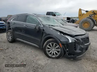 2019 Cadillac XT4 AWD Premium Luxury с VIN 1GYFZDR4XKF117964, выставлен на аукционе Copart как лот 52339265 с пробегом 99 840 миль миль и Списание • Salvage title. История ставок и продаж доступна на DreamBid. Изображение 4.