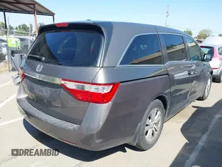 2012 Honda Odyssey EX-L with VIN 5FNRL5H65CB012428, listed as a IAAI auction lot 42164272 with 256,253 mi miles and . Bid and sale history available at carsss.com. Image 4.