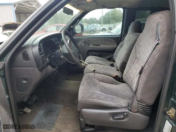 1999 Dodge Ram 1500 with VIN 3B7HC13Y6XG163338, listed as a Copart auction lot 67640594 with 207,847 mi miles and Salvage Title. Bid and sale history available at carsss.com. Image 7.