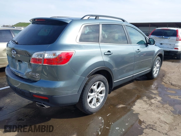 2011 Mazda CX-9 Touring z VIN JM3TB3CV6B0308283, wystawiony jako IAAI lot #41739538 z przebiegiem 96 507 mil mil oraz . Historia ofert i sprzedaży dostępna na DreamBid. Obrazek 4.