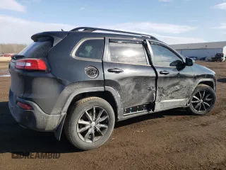 2014 Jeep Cherokee Altitude with VIN 1C4PJMCS0EW291247, listed as a Copart auction lot 47694115 with 124,775 mi miles and Salvage Title. Bid and sale history available at carsss.com. Image 3.