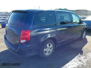 2013 Dodge Grand Caravan SXT with VIN 2C4RDGCGXDR527973, listed as a IAAI auction lot 41930036 with 111,985 mi miles. Bid and sale history available at carsss.com. Image 4.