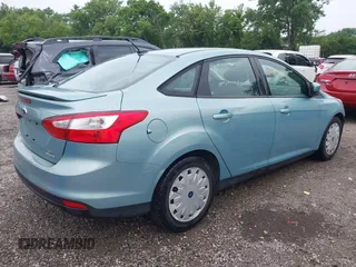 2012 Ford Focus SE with VIN 1FAHP3F29CL464650, listed as a IAAI auction lot 42495994 with 142,336 mi miles and . Bid and sale history available at DreamBid. Image 4.
