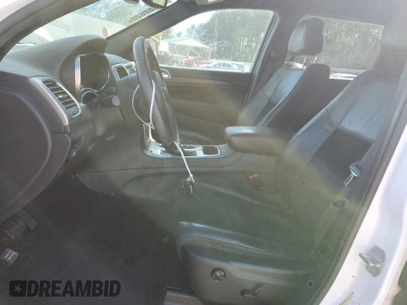 2018 Jeep Grand Cherokee Altitude with VIN 1C4RJFAG8JC189564, listed as a Copart auction lot 55488625 with 69,871 mi miles and Salvage title. Bid and sale history available at DreamBid. Image 7.
