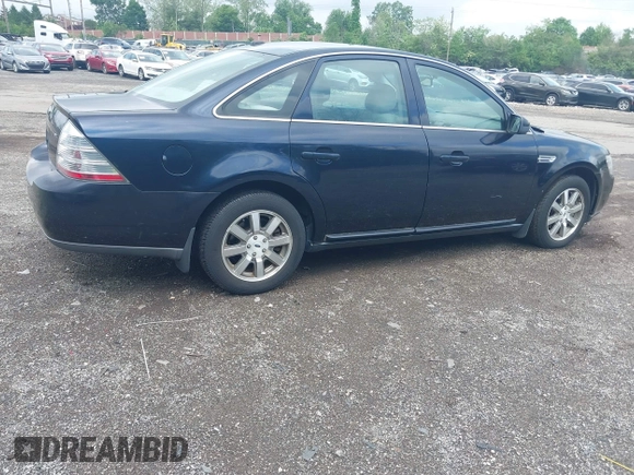 2009 Ford Taurus SEL with VIN 1FAHP24W89G106621, listed as a IAAI auction lot 42209803 with 60,373 mi miles. Bid and sale history available at carsss.com. Image 4.