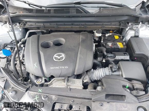 2021 Mazda CX-5 Touring with VIN JM3KFBCM9M1329806, listed as a IAAI auction lot 41825123 with 59,300 mi miles. Bid and sale history available at carsss.com. Image 10.