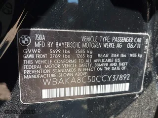 2012 BMW 7 Series 750i with VIN WBAKA8C50CCY37892, listed as a IAAI auction lot 42080313 with 148,058 mi miles. Bid and sale history available at carsss.com. Image 9.