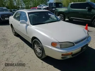 1996 Toyota Camry LE z VIN JT2BF12K5T0172341, wystawiony jako Copart lot #53384845 z przebiegiem 308 235 mil mil oraz Szkoda całkowita • Salvage title. Historia ofert i sprzedaży dostępna na DreamBid. Obrazek 13.
