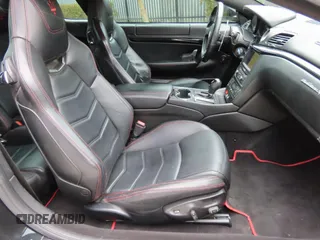 2013 Maserati GranTurismo Sport z VIN ZAM45VLAXD0072023, wystawiony jako Copart lot #59033745 z przebiegiem 86 009 mil mil oraz Szkoda całkowita • Salvage title. Historia ofert i sprzedaży dostępna na DreamBid. Obrazek 5.