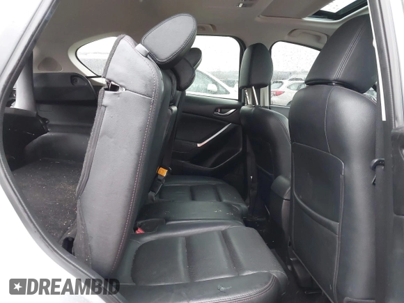 2016 Mazda CX-5 Grand Touring with VIN JM3KE4DY4G0712465, listed as a IAAI auction lot 41859217 with 61,806 mi miles and . Bid and sale history available at carsss.com. Image 8.