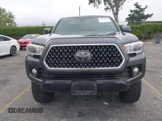 2018 Toyota Tacoma SR5 with VIN 3TMAZ5CN1JM071396, listed as a IAAI auction lot 42061640 with 122,148 mi miles and . Bid and sale history available at DreamBid. Image 12.
