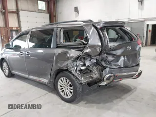 2011 Toyota Sienna XLE AAS with VIN 5TDYK3DC0BS063232, listed as a IAAI auction lot 42433187 with 198,252 mi miles and . Bid and sale history available at DreamBid. Image 3.