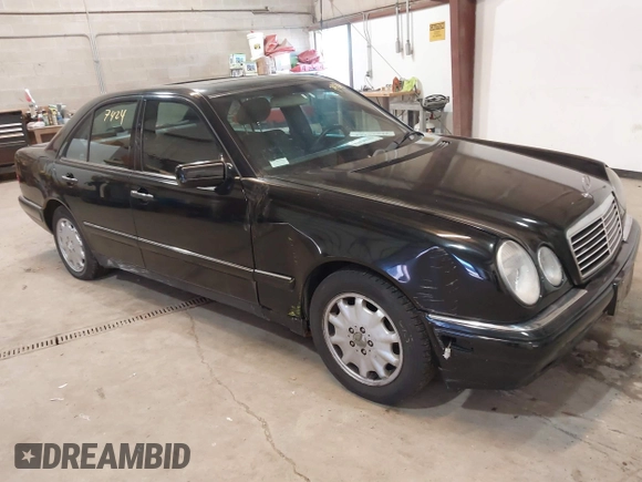 1998 Mercedes-Benz E-Class with VIN WDBJF65F7WA617755, listed as a IAAI auction lot 41737424 with 113,068 mi miles. Bid and sale history available at carsss.com. Image 1.