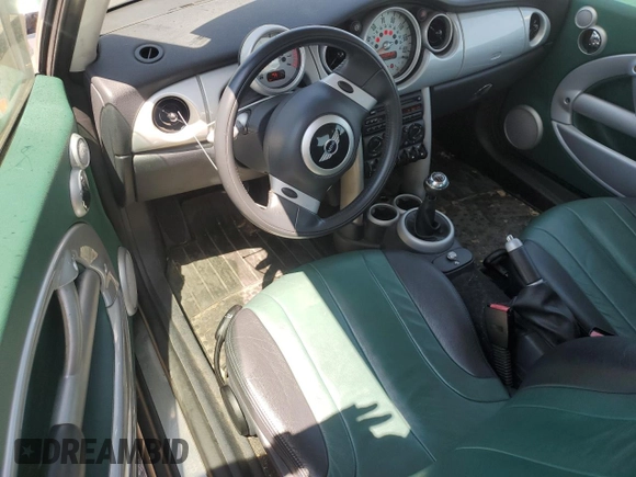 2002 MINI Hardtop with VIN WMWRC33442TC35176, listed as a Copart auction lot 65486135 with 58,504 mi miles and Clean title. Bid and sale history available at DreamBid. Image 8.