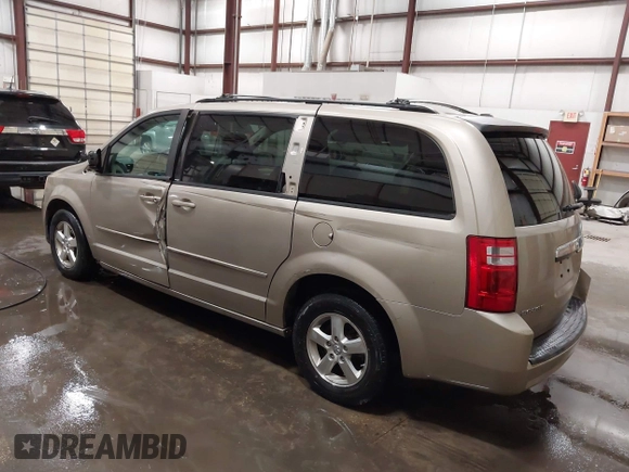 2009 Dodge Grand Caravan SXT z VIN 2D8HN541X9R652097, wystawiony jako IAAI lot #42370946 z przebiegiem 189 911 mil mil oraz . Historia ofert i sprzedaży dostępna na DreamBid. Obrazek 3.