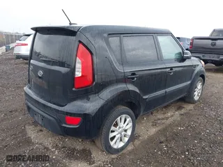 2012 Kia Soul + with VIN KNDJT2A68C7748646, listed as a IAAI auction lot 42072847 with 129,357 mi miles. Bid and sale history available at carsss.com. Image 4.