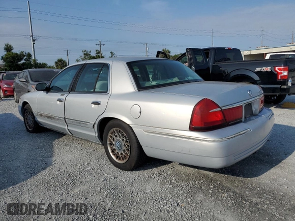 2000 Mercury Grand Marquis GS z VIN 2MEFM74W0YX715104, wystawiony jako Copart lot #54357855 z przebiegiem 111 231 mil mil oraz Szkoda całkowita • Salvage title. Historia ofert i sprzedaży dostępna na DreamBid. Obrazek 2.