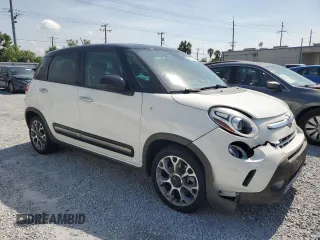 2014 FIAT 500L Trekking with VIN ZFBCFADH9EZ015734, listed as a Copart auction lot 57647185 with 67,302 mi miles and Salvage title. Bid and sale history available at DreamBid. Image 4.