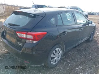 2017 Subaru Impreza with VIN 4S3GTAA60H3746716, listed as a IAAI auction lot 41846153 with 76,704 mi miles. Bid and sale history available at carsss.com. Image 4.