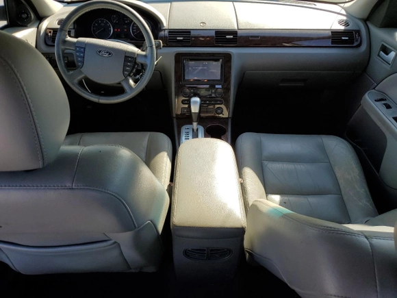 2007 Ford Five Hundred SEL with VIN 1FAHP24177G114422, listed as a Copart auction lot 77028184 with 0 mi miles and Salvage Title. Bid and sale history available at carsss.com. Image 8.