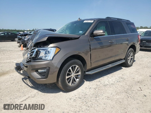 2019 Ford Expedition XLT with VIN 1FMJU1HT7KEA03878, listed as a Copart auction lot 52351735 with 25,615 mi miles and Salvage Title. Bid and sale history available at carsss.com. Image 1.