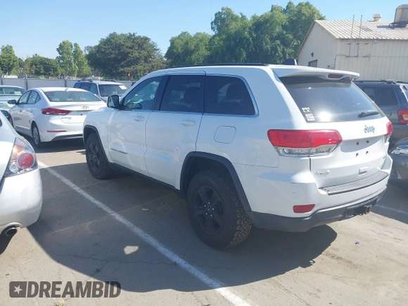 2014 Jeep Grand Cherokee Laredo with VIN 1C4RJFAG9EC334021, listed as a IAAI auction lot 42128823 with 161,741 mi miles. Bid and sale history available at carsss.com. Image 3.