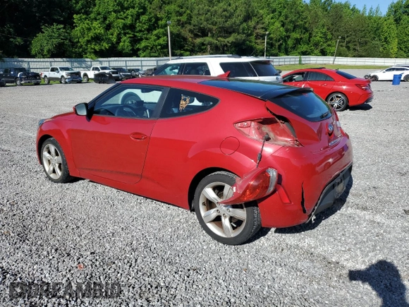 2013 Hyundai Veloster w/Black Int with VIN KMHTC6AD2DU126699, listed as a Copart auction lot 57329805 with 85,303 mi miles and Salvage title. Bid and sale history available at DreamBid. Image 2.