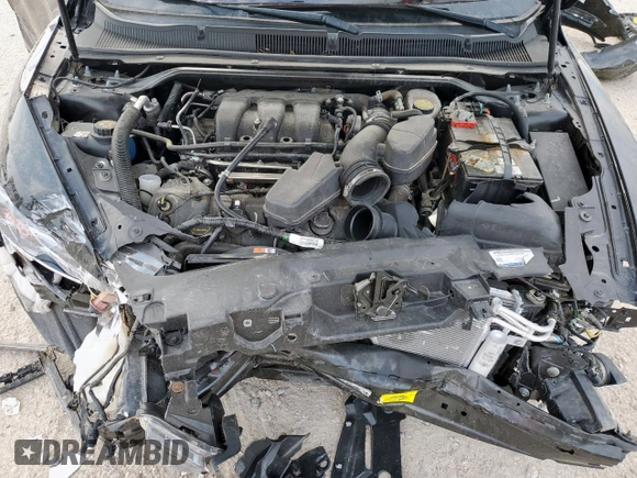 2018 Ford Taurus SEL z VIN 1FAHP2E87JG136553, wystawiony jako Copart lot #57759635 z przebiegiem 33 464 mil mil oraz Szkoda całkowita • Salvage title. Historia ofert i sprzedaży dostępna na DreamBid. Obrazek 11.