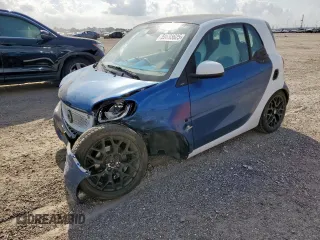 2016 Smart fortwo Passion с VIN WMEFJ5DA9GK074895, выставлен на аукционе Copart как лот 59893625 с пробегом 27 144 миль миль и Списание • Salvage title. История ставок и продаж доступна на DreamBid. Изображение 1.