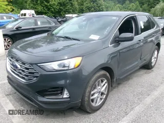 2021 Ford Edge SEL z VIN 2FMPK4J95MBA51071, wystawiony jako IAAI lot #42567255 z przebiegiem 74 509 mil mil oraz . Historia ofert i sprzedaży dostępna na DreamBid. Obrazek 1.