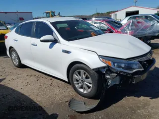 2016 Kia Optima LX with VIN 5XXGT4L34GG069088, listed as a IAAI auction lot 41829114 with 142,760 mi miles. Bid and sale history available at carsss.com. Image 1.