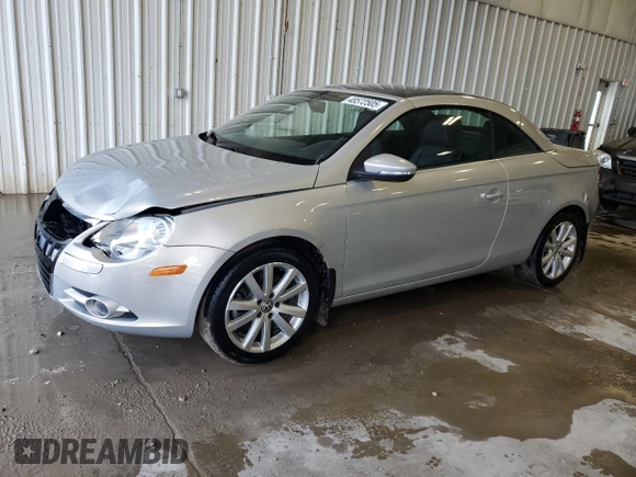 2009 Volkswagen Eos Komfort with VIN WVWBA71F69V010324, listed as a Copart auction lot 48572505 with 103,045 mi miles and Clean Title. Bid and sale history available at DreamBid. Image 1.